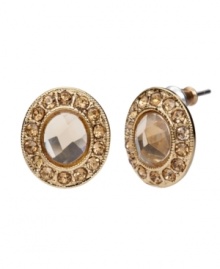 A fitting choice for fall. Topaz-colored accents in glass and resin add seasonal style to these pretty round post earrings from Monet. Crafted in gold tone mixed metal, they'll add a fashionable finishing touch to your wardrobe. Approximate length: 5/8 inch. Approximate width: 1/2 inch.