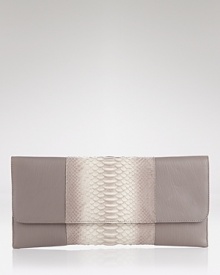 The exotic trend goes compact with this python clutch from Carlos Falchi. Boasting an eye-catching ombre leather, this accessory tips the scales after hours. The exotic trend goes compact with this python clutch from Carlos Falchi. Boasting an eye-catching ombre leather, this accessory tips the scales after hours.