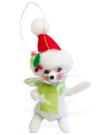 Filled with cheer, this snow-white mouse boasts a Santa hat, patterned scarf and the distinct charm of Annalee ornaments.