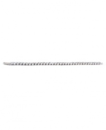 Truly eye-catching beauty by CRISLU. This tennis bracelet features round-cut cubic zirconia (10 ct. t.w.) set in sterling silver with a platinum finish. Approximate length: 7 inches. Truly eye-catching beauty by CRISLU. This tennis bracelet features round-cut cubic zirconia (10 ct. t.w.) set in sterling silver with a platinum finish. Approximate length: 7 inches.