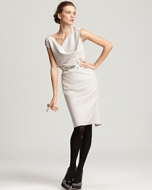 This Lafayette 148 New York felted wool dress embodies modern sophistication in a pared-down silhouette with an elegant fold sweeping the collar and a slim silver belt. This Lafayette 148 New York felted wool dress embodies modern sophistication in a pared-down silhouette with an elegant fold sweeping the collar and a slim silver belt.