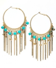 INC International Concepts take traditional hoops to a whole, new level. Trendy fringe and plastic turquoise beading mixed with diamond dust beads and glass rondelles create a head-turning style. Set in mixed metal. Approximate drop: 2-1/4 inches. INC International Concepts take traditional hoops to a whole, new level. Trendy fringe and plastic turquoise beading mixed with diamond dust beads and glass rondelles create a head-turning style. Set in mixed metal. Approximate drop: 2-1/4 inches.