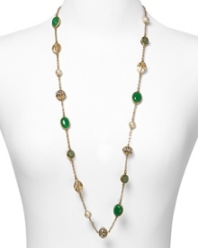 Splashed with pearls, jade stones, and golden beads, this Carolee Lux necklace is a spectacular statement piece. Wear it to bring eclectic sparkle to your neckline.