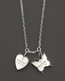 Embossed heart and butterfly charms dangle from an 18L sterling silver chain. From Gucci's Trademark collection.