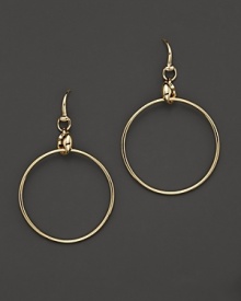 Delicate horsebits top gleaming 18K yellow gold hoops from Gucci.