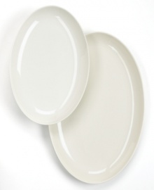 Keep it simple. In glossy white porcelain, this oval serving platter is a flawless accompaniment to any dinnerware pattern and decor. From Martha Stewart Collection. Keep it simple. In glossy white porcelain, this oval serving platter is a flawless accompaniment to any dinnerware pattern and decor. From Martha Stewart Collection.