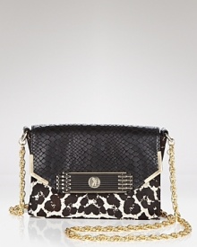Tap two trends with one bag by carrying this haircalf and embossed leather pouchette from Sam Edelman. Compact and pattern-blocked, it's setting a double standard. Tap two trends with one bag by carrying this haircalf and embossed leather pouchette from Sam Edelman. Compact and pattern-blocked, it's setting a double standard.