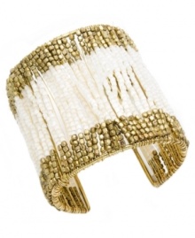 Cuff love! You'll adore Style&co.'s beautifully-beaded cuff bracelet. White and gold glass bugle beads combine for a shimmering effect. Set in gold-plated mixed metal. Approximate diameter: 2-1/4 inches. Cuff love! You'll adore Style&co.'s beautifully-beaded cuff bracelet. White and gold glass bugle beads combine for a shimmering effect. Set in gold-plated mixed metal. Approximate diameter: 2-1/4 inches.