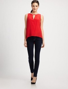 Vibrant silk finished with a front cutout and strappy open back for an alluring touch of skin-baring chic.JewelneckSleevelessFront cutoutBack top-button closureAbout 24 from shoulder to hemSilkDry cleanImportedModel shown is 5'9½ (176cm) wearing US size Small. Vibrant silk finished with a front cutout and strappy open back for an alluring touch of skin-baring chic.JewelneckSleevelessFront cutoutBack top-button closureAbout 24 from shoulder to hemSilkDry cleanImportedModel shown is 5'9½ (176cm) wearing US size Small.