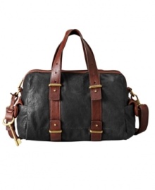 With the size of a small duffle and the pure fashion of a purse, this leather satchel from Fossil features two-tone leather in a range of vibrant colors. Handy side pockets and a just-the-right-size interior make it must for everyday wear. With the size of a small duffle and the pure fashion of a purse, this leather satchel from Fossil features two-tone leather in a range of vibrant colors. Handy side pockets and a just-the-right-size interior make it must for everyday wear.