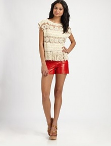 Crocheted florals pair with tasseled fringe in this light, open-weave pullover.BoatneckExtended shouldersPullover styleAbout 23 from shoulder to hemRayonDry cleanImportedModel shown is 5'10 (177cm) wearing US size Small. Crocheted florals pair with tasseled fringe in this light, open-weave pullover.BoatneckExtended shouldersPullover styleAbout 23 from shoulder to hemRayonDry cleanImportedModel shown is 5'10 (177cm) wearing US size Small.