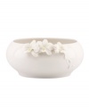 Sculpted orchids pop with a tinge of yellow against this glossy white Flora bowl A quiet beauty in graceful Lenox porcelain. Qualifies for Rebate