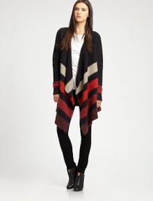 Crafted with a contrasting striped pattern, this lengthy cardigan has an asymmetrical cropped back hem and plush, cashmere-like finish. Open frontLong sleevesAsymmetrical cropped back hemAbout 41 from shoulder to hem68% wool/23% mohair/9% nylonDry cleanImported of Italian fabricModel shown is 5'9 (176cm) wearing US size Small.This style runs true to size. We recommend ordering your usual size for a standard fit. 