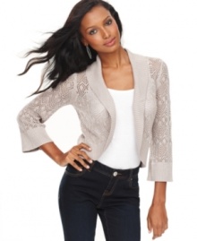 Layer your sleeveless styles with INC's open front cardigan, showcasing a metallic finish.