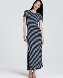 Cut a graphic silhouette in this MICHAEL Michael Kors maxi dress sharply styled with shoulder-to-shoe stripes. Punctuate the optic silhouette with acid-bright accents.