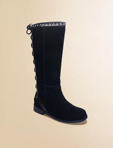 This classic faux-suede riding boot features shimmering silvertone grommets and a gorgeous lace-up back.Inside zip closureLug soleSynthetic upper with polyester blendSynthetic microfiber liningImportedAdditional InformationKid's Shoe Size Guide (European Equivalent) This classic faux-suede riding boot features shimmering silvertone grommets and a gorgeous lace-up back.Inside zip closureLug soleSynthetic upper with polyester blendSynthetic microfiber liningImportedAdditional InformationKid's Shoe Size Guide (European Equivalent)