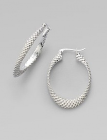 This sterling silver design features a pebbly finish. Sterling silver Drop, about 1¼ Post back Imported This sterling silver design features a pebbly finish. Sterling silver Drop, about 1¼ Post back Imported