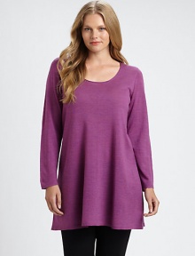 Offering you a more elongated silhouette, a brilliant, a merino wool tunic with a feminine neckline. It would look amazing with leggings or skinnies. ScoopneckLong sleevesPull-on styleAbout 33 from shoulder to hemMerino woolDry cleanImported of Italian fabric