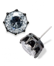 Glitz and glamour can be yours with this pair of oversized stud earrings from Juicy Couture. Cast in a round silver tone brass, a sparkling cubic zirconia (8 ct. t.w.) lights up the night. Approximate diameter: 3/8 inch.