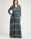 A brilliant print adorns this floor-length dress with a universally flattering wrap design. You will love how the modal fabrication with a touch of stretch complements your curves.Wrap frontLong sleevesPull-on styleAllover printSelf-tie beltAbout 63 from natural waist92% modal/8% spandexDry cleanMade in USA