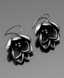 Infuse your look with nature. These beautiful Fossil flower earrings are crafted in silvertone mixed metal with a vintage finish. Approximate drop: 1 inch.