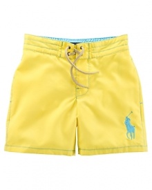 An embroidered Big Pony gives a heritage look to a brightly hued swim trunk in soft, lightweight woven cotton. An embroidered Big Pony gives a heritage look to a brightly hued swim trunk in soft, lightweight woven cotton.