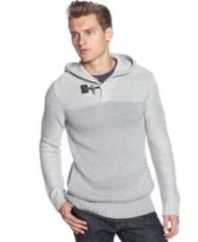 Top me over your a shirt or under a jacket with this pullover hooded merino sweater by Calvin Klein.