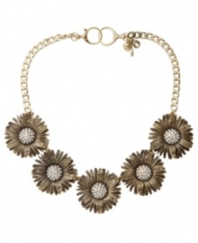 Spruce up your look for spring. Fossil's vintage-themed collar necklace features five intricate daisy's with sparkling crystal-coated centers. Setting crafted in oxidized brass tone mixed metal with a lobster claw closure. Approximate length: 18 inches.