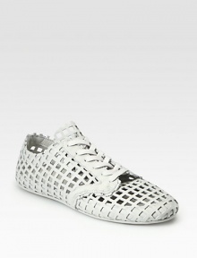 Sporty, modern lace-up design in woven leather.Leather liningPadded insoleRubber soleImported Sporty, modern lace-up design in woven leather.Leather liningPadded insoleRubber soleImported