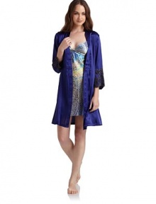 THE LOOKWrap front with tie closureThree-quarter length sleeves with lace appliquéd cuffsDual side seam pocketsFront tie waist with back ruchingTHE FITAbout 39 from shoulder to hemTHE MATERIALPolyesterCARE & ORIGINMachine washImported THE LOOKWrap front with tie closureThree-quarter length sleeves with lace appliquéd cuffsDual side seam pocketsFront tie waist with back ruchingTHE FITAbout 39 from shoulder to hemTHE MATERIALPolyesterCARE & ORIGINMachine washImported