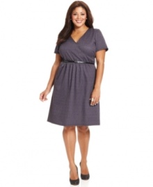 A flattering A-line shape elegantly defines NY Collection's short sleeve plus size dress, accented by a belted waist.