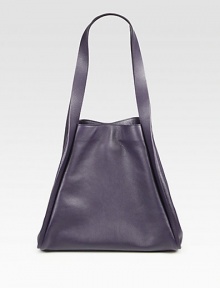 Smooth leather crafted in a roomy carryall.Shoulder straps, 10 dropMagnetic snap closure and gussetsProtective metal feetOne inside open pocket19W X 11½H X 8DImported Smooth leather crafted in a roomy carryall.Shoulder straps, 10 dropMagnetic snap closure and gussetsProtective metal feetOne inside open pocket19W X 11½H X 8DImported