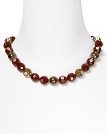 Red and bronze faceted beads lend rich shine to this necklace from Carolee.