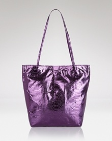 Carlos Falchi's tote is a luxe take on a classic shape. In metallic micro-fiber with an interior pouch, this style strikes an enviable balance between practicality and polish. Carlos Falchi's tote is a luxe take on a classic shape. In metallic micro-fiber with an interior pouch, this style strikes an enviable balance between practicality and polish.