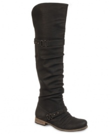 Put these rugged beauties to work. Carlos by Carlos Santana's Wheeling over-the-knee boots feature ruche detailing along the vamp and a sturdy heel that will get you through the toughest days.