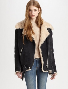 Concluded by a buckled hem and plethora of asymmetrical zippers, this leather topper has plush shearling trim and lining. Notched shearling collarAsymmetrical zipper and snap closuresLong sleeves with zippered cuffsZippered slash pocketsAdjustable buckle at hemAbout 31 from shoulder to hemLambskin leather with shearling trim and liningFur origin: UruguayDry clean with fur specialistImportedModel shown is 5'10 (177cm) wearing US size 4. Concluded by a buckled hem and plethora of asymmetrical zippers, this leather topper has plush shearling trim and lining. Notched shearling collarAsymmetrical zipper and snap closuresLong sleeves with zippered cuffsZippered slash pocketsAdjustable buckle at hemAbout 31 from shoulder to hemLambskin leather with shearling trim and liningFur origin: UruguayDry clean with fur specialistImportedModel shown is 5'10 (177cm) wearing US size 4.