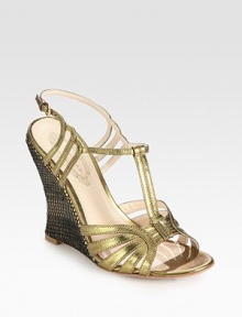 Skinny metallic leather t-strap with an adjustable slingback and a woven, contoured wedge. Woven leather wedge, 4½ (115mm)Metallic leather upperLeather lining and solePadded insoleImportedOUR FIT MODEL RECOMMENDS ordering one size up as this style runs small. 