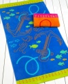 Drop the anchor! Enjoy the sun and sand with this beach towel from Martha Stewart Collection, featuring an anchor motif in fun, vibrant colors.