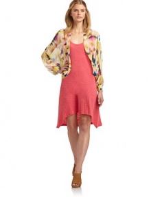THE LOOKSheer constructionMulticolored ikat print, alloverDolman sleeves with barrel cuffsOpen frontTHE FITAbout 23 from shoulder to hemTHE MATERIALSilkCARE & ORIGINDry cleanImportedModel shown is 5'10 (177cm) wearing US size Small. THE LOOKSheer constructionMulticolored ikat print, alloverDolman sleeves with barrel cuffsOpen frontTHE FITAbout 23 from shoulder to hemTHE MATERIALSilkCARE & ORIGINDry cleanImportedModel shown is 5'10 (177cm) wearing US size Small.
