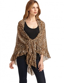 THE LOOKAllover leopard printTie at hemRuffles hemTHE FITAbout 20 from shoulder to hemTHE MATERIALPolyesterCARE & ORIGINDry cleanImported THE LOOKAllover leopard printTie at hemRuffles hemTHE FITAbout 20 from shoulder to hemTHE MATERIALPolyesterCARE & ORIGINDry cleanImported