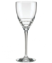 Three sharp lines juxtapose the fluid elegance of this wine glass from the Percival Place crystal stemware collection for a look of brilliant sophistication by kate spade new york.