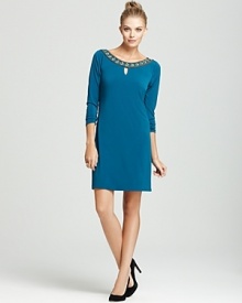 A jeweled neckline lends opulence to this Laundry by Shelli Segal jersey dress.