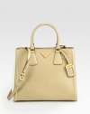 A two-tone style in luxurious saffiano leather.Double top handles, 5½ dropDetachable adjustable shoulder strap, 17-19 dropSnap button closureProtective metal feetTwo inside zip pocketsThree inside open pocketsLogo lining13W X 11H X 6¼DMade in Italy