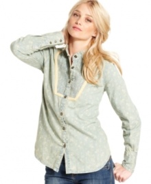 An allover floral print adds a hint of femininity to this otherwise boyish chambray shirt by Free People!