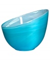 Electrify your home with the eye-catching Candy Blue collection from Sea Glasbruk. Caribbean blues swirl and wrap the minimalist glass bowl in a sweet celebration of color. With an askew rim and slick, glazed finish.