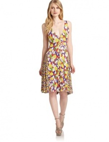 THE LOOKAllover tulip printButton-frontPleated skirtTHE FITAbout 39 from shoulder to hemTHE MATERIALCuproFully linedCARE & ORIGINDry cleanMade in ItalyModel shown is 5'9½ (176cm) wearing US size 4. THE LOOKAllover tulip printButton-frontPleated skirtTHE FITAbout 39 from shoulder to hemTHE MATERIALCuproFully linedCARE & ORIGINDry cleanMade in ItalyModel shown is 5'9½ (176cm) wearing US size 4.