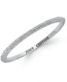 Bring on the sparkle! Juicy Couture's bangle bracelet flaunts shimmering pave crystals and an engraved logo at the inner ring. Crafted in silver tone mixed metal. Approximate diameter: 2-1/4 inches. Bring on the sparkle! Juicy Couture's bangle bracelet flaunts shimmering pave crystals and an engraved logo at the inner ring. Crafted in silver tone mixed metal. Approximate diameter: 2-1/4 inches.