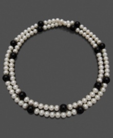 This lovely string of luminous cultured freshwater pearls (7-8 mm) offset by the dark beauty of onyx (7-8 mm) goes with anything, for any occasion. Approximate length: 36 inches. This lovely string of luminous cultured freshwater pearls (7-8 mm) offset by the dark beauty of onyx (7-8 mm) goes with anything, for any occasion. Approximate length: 36 inches.