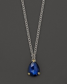 Faceted pear cut corundum lends brilliance to 18K gold detailed sterling silver. By Judith Ripka.