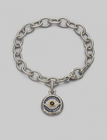 Bold, textured links of sterling silver hold a protective evil eye charm, radiantly created of white, blue and black sapphires with a touch of 18k gold. Sapphires Sterling silver and 18k yellow gold Bracelet length, about 7½ Charm diameter, about ¾ Heart-shaped lobster clasp Made in USA Bold, textured links of sterling silver hold a protective evil eye charm, radiantly created of white, blue and black sapphires with a touch of 18k gold. Sapphires Sterling silver and 18k yellow gold Bracelet length, about 7½ Charm diameter, about ¾ Heart-shaped lobster clasp Made in USA